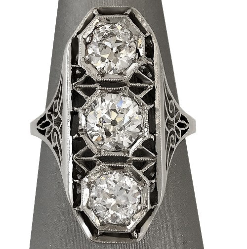 Close-up capturing the antique diamond faceting and fine openwork detail.