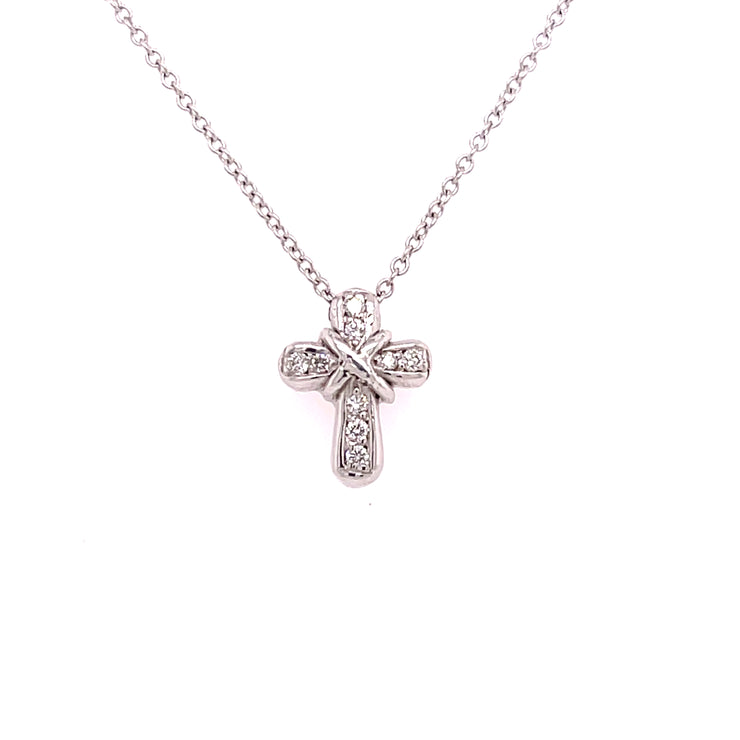 Diamond cross pendant shown in detail. 