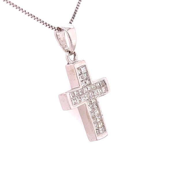 Diamond cross pendant shown from the side.