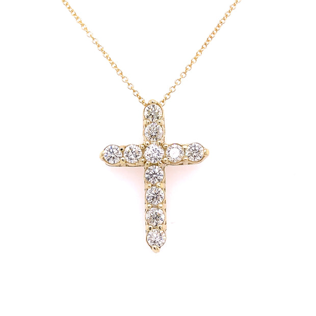 A 1.50 CTW diamond cross necklace set in 14K yellow gold.