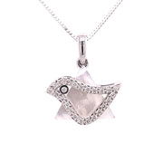  Mother of pearl centerpiece with a sculpted dove motif.