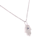 A side detail of the Diamond Hamsa pendant.