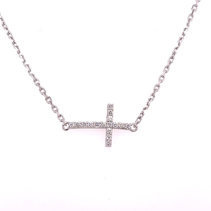 Set in polished 14K white gold, the design features 0.12 carats total weight of round brilliant cut diamonds.