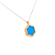 Bright and beautiful this turquoise pendant looks both stacked and worn alone.