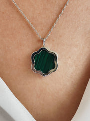  Set in polished 18K white gold for a sleek, modern finish.