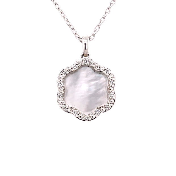 A Mother of Pearl and Diamond Daniella Necklace with a Mother of Pearl centerpiece and diamond accents, crafted in 18K white gold.