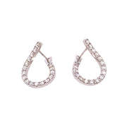 A pair of teardrop-shaped hoop earrings with round brilliant cut diamonds set in 14k White Gold.