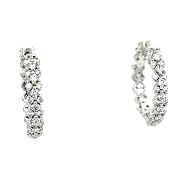 Diamond hoop earrings in white gold.