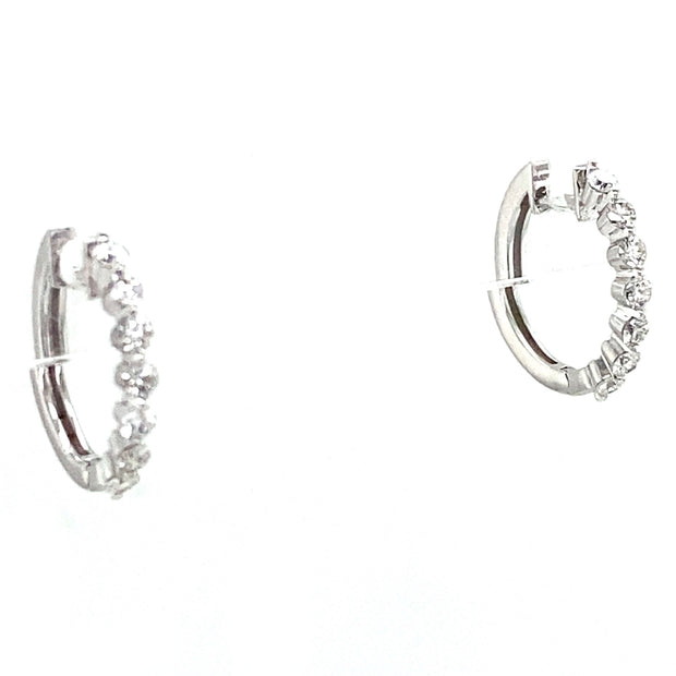 Pair of 18K white gold mini diamond hoop earrings.