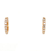 Mini diamond hoops in rose gold.