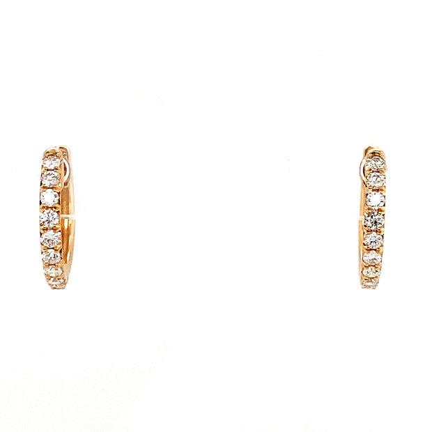 Mini diamond hoops in rose gold.