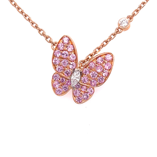 18K rose gold butterfly pendant with sapphires and diamonds.