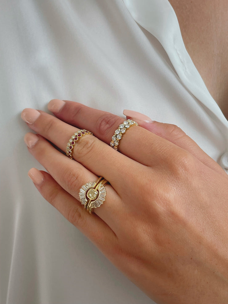 Shown here on model stacked with other diamond bands.