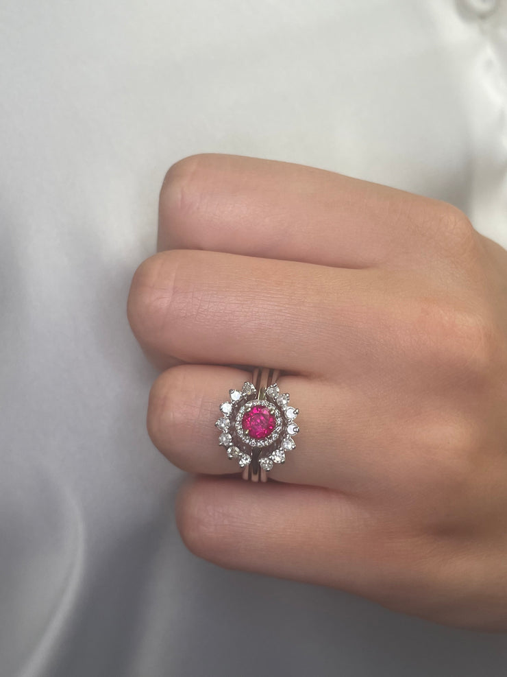 Shown here stacked on models hand.