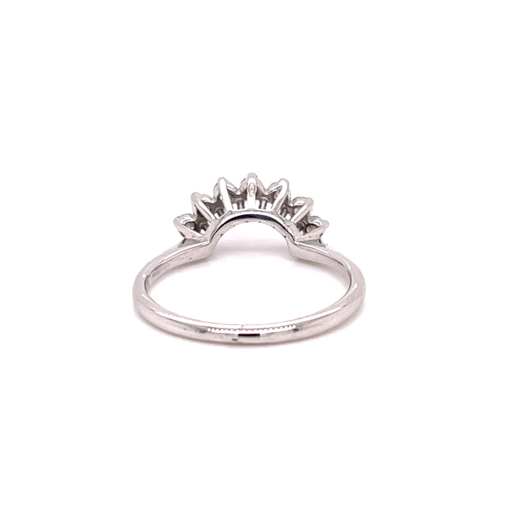 white gold and diamond arched staking ring shown form the back.