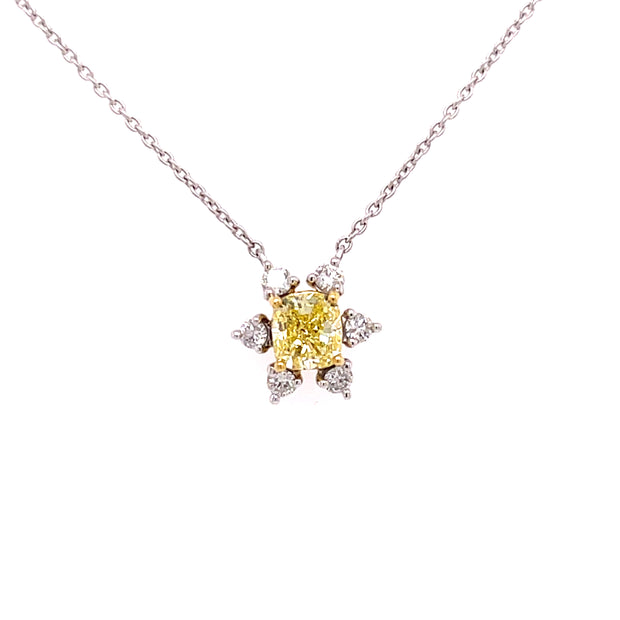 Starburst pendant necklace featuring a fancy yellow daimond at the center.