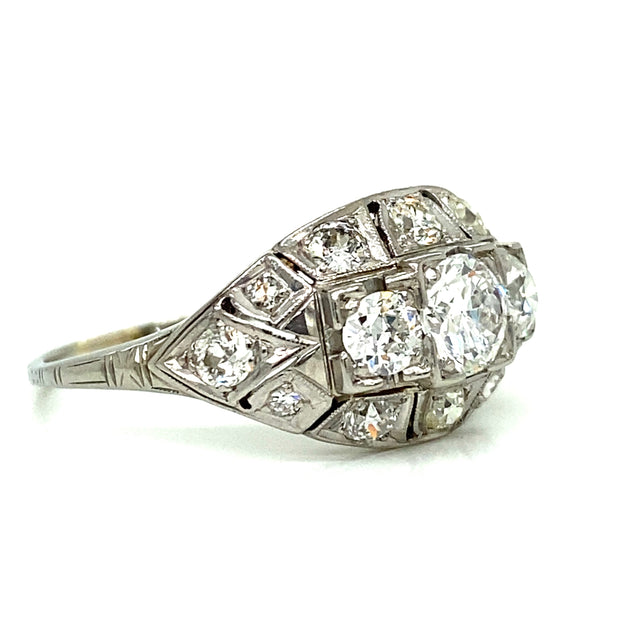  Art Deco ring with diamonds is set in 18K white gold with delicate milgrain detailing. 
