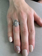 Shown on hand, this stunning diamond shaped shelid ring shines with 1.02cts of natural diamonds.