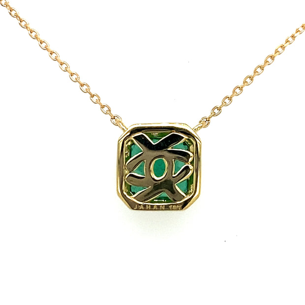 Shown from the back of the pendant we see the hallmark and intricate design.