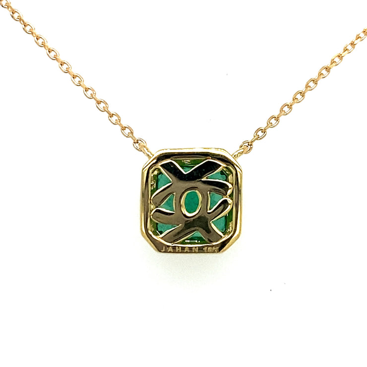Shown from the back of the pendant we see the hallmark and intricate design.