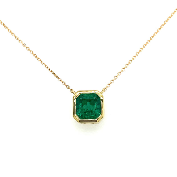 Stunning assher-cut emerald pendant.