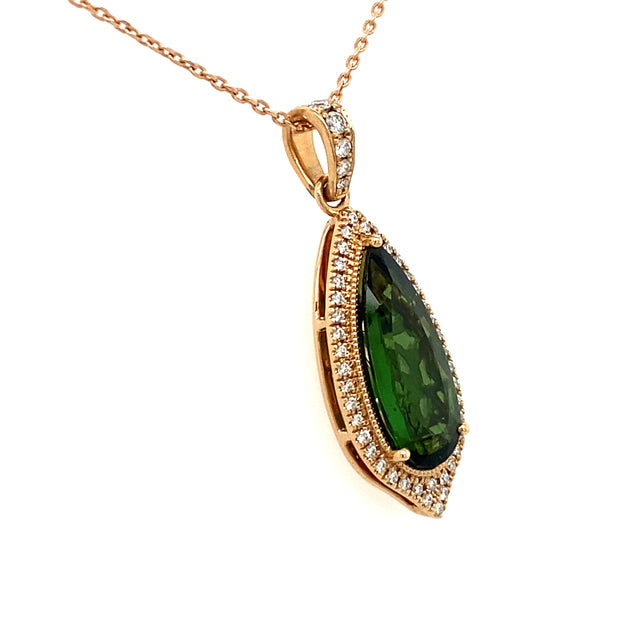 A view of the Tourmaline and diamond pendant from the side.