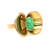 Apple green jade cabochon (approx. 9mm x 6mm) with luminous translucence.