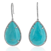 18K white gold dangle earrings with pear-shaped cabochon turquoise and round brilliant diamonds
