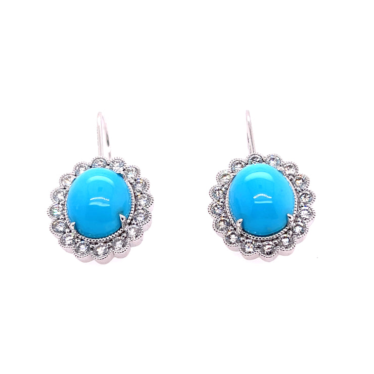 A closer look at the natural turquoise and diamond halo earrings.