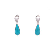 Turquoise and diamond acented dangle drop earrings.