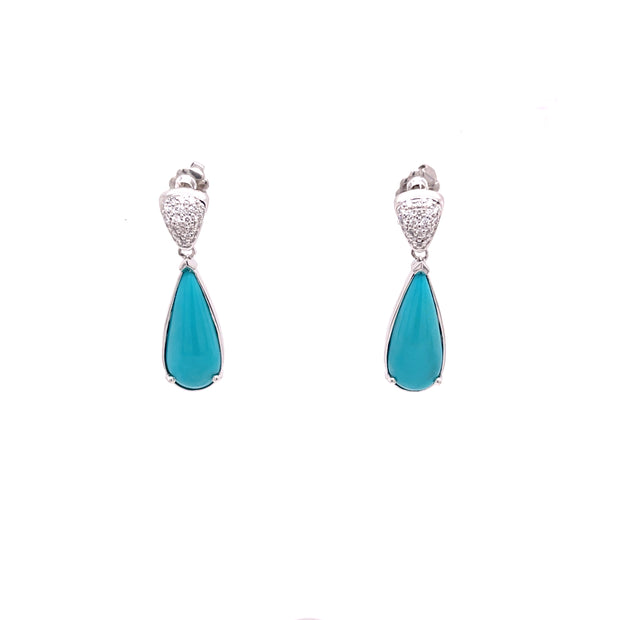 Turquoise and diamond acented dangle drop earrings.