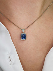 Stunning blue sapphire and diamond necklace shown on model.