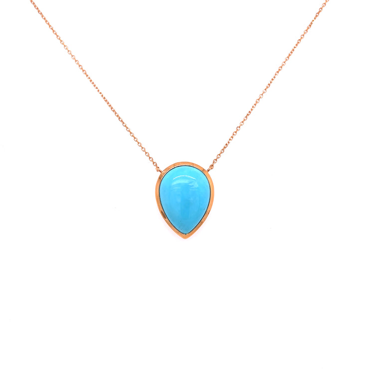Bright blue hue of the turquoise is complemented by the warm rose gold setting.