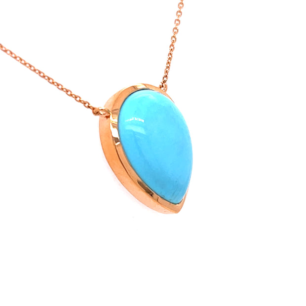 Shown here the pendant at an angled view showcasing the attatched chain.