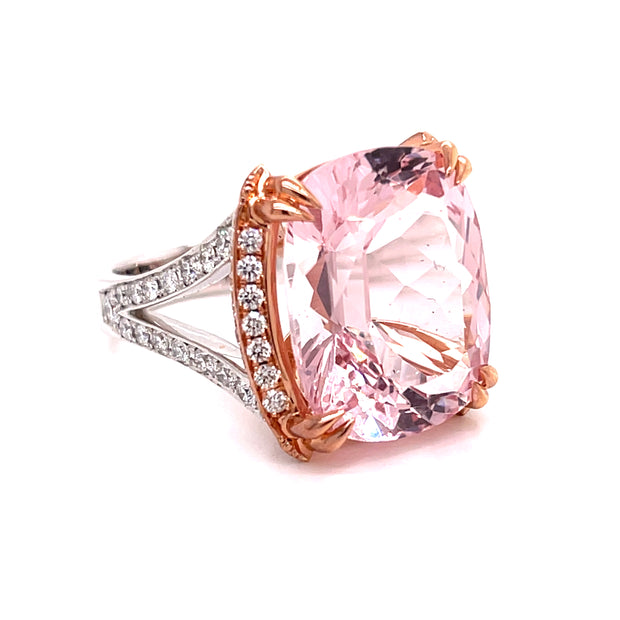 A two-tone ring with a cushion cut Kunzite gemstone in rose gold setting, accompanied by round brilliant cut diamonds.
