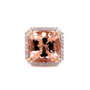 A close front detail of the soft pink of the morganite with the sparkle of diamond halo that surrounds.