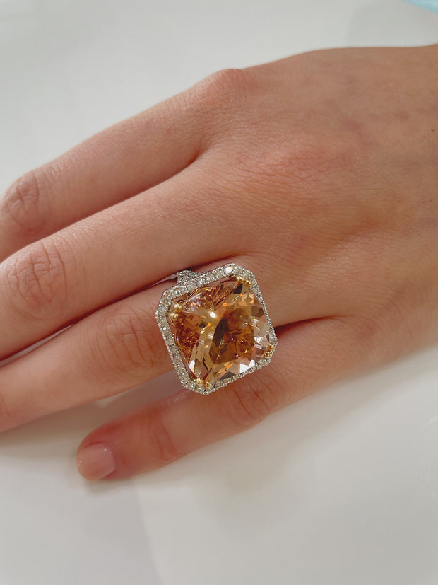 Shown here in detail on models hand.