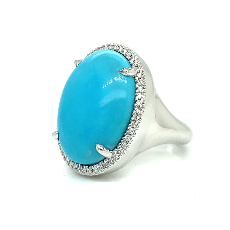  0.22ctw round brilliant diamond halo for refined sparkle.