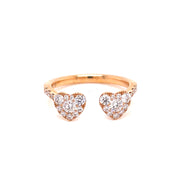 Two heart-shaped bypass ring, totaling 0.49 CTW of round brilliant cut diamonds.