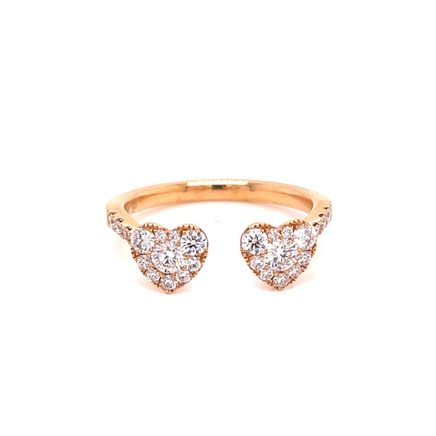 Two heart-shaped bypass ring, totaling 0.49 CTW of round brilliant cut diamonds.