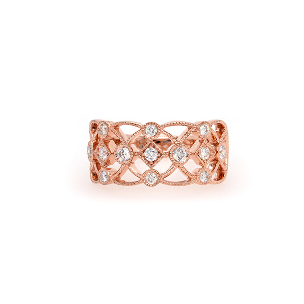 A close llook at the warm rose gold paired with the sparkling round diamonds.
