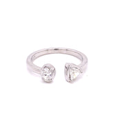 0.40 CTW Oval & Trillion Cut Diamond Two-Stone Bypass ring set in 18 KWG