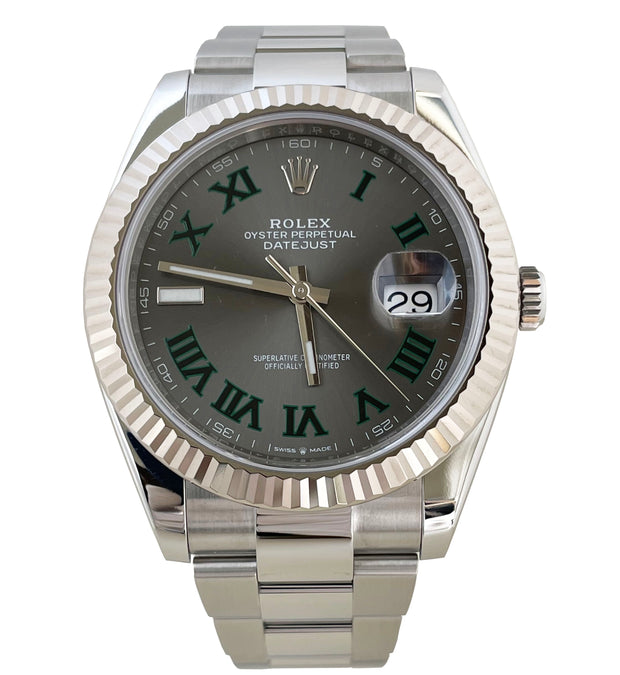 Shown here with slate grey dial and contrasting bold green acented Roman numerals.