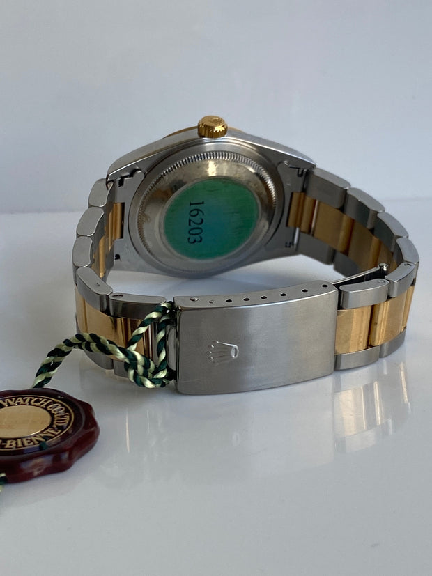 Rolex Datejust Two Tone Oyster shown from the back showcasing the fold over deployment closure.