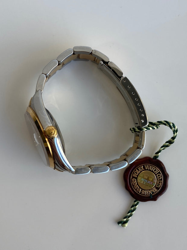 Rolex Datejust Two Tone Oyster shown here on it's side showcasing the thickness of bracelet and case.
