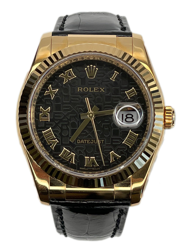 A stunning close up showcasing it's striking black “Jubilee” anniversary dial, featuring a textured pattern composed of the word “ROLEX” subtly embossed throughout the surface.