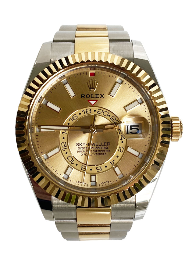 A close look at the gold dial and two tone oyster bracelet.