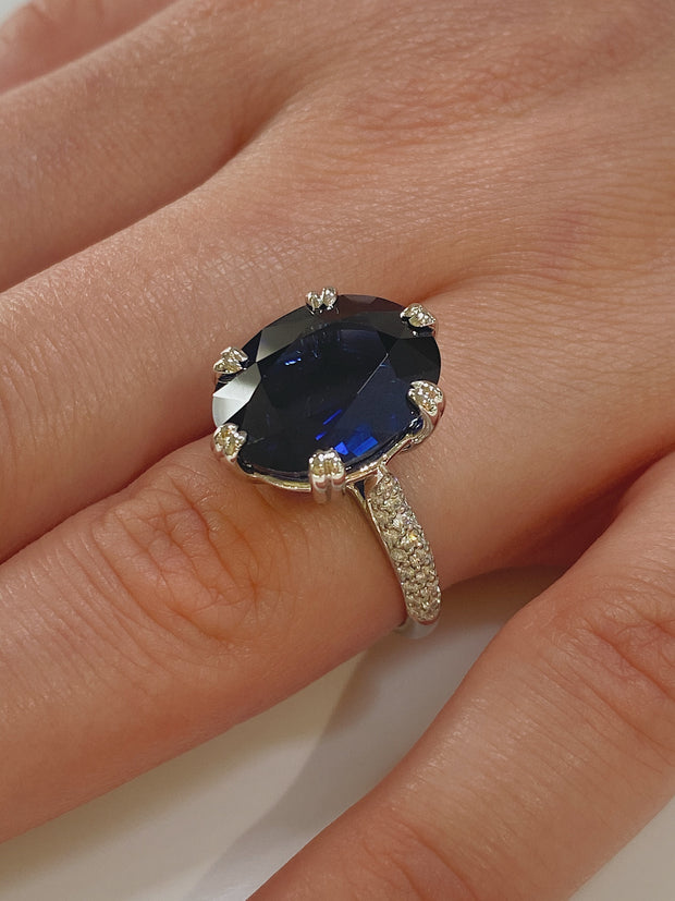 11.26 CT Oval Cut Sapphire with 0.38 CTW Round Brilliant Cut Pave Set Diamond Ring set in Platinum