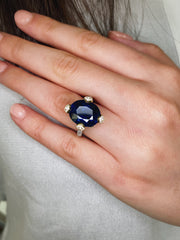 11.47 CT Oval Cut Sapphire with 1.13 CTW Round Brilliant Cut Diamonds Ring Set in 18 KYG and Platinum GRS Certified