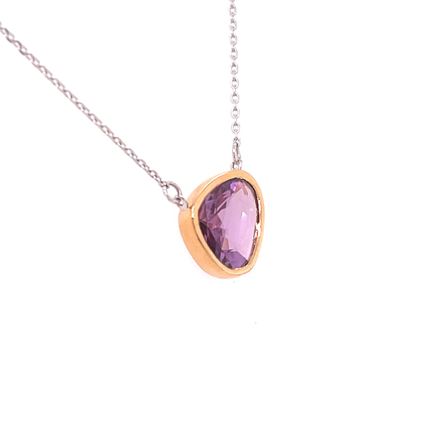 1.41 carat natural pink sapphire slice with organic shape.